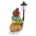 Figurka krasnal na ślimaku