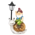 Figurka krasnal na ślimaku